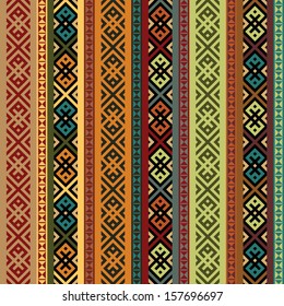 multicolored ethnic seamless background.  vertical stripes textures in green and orange, red, blue, black colors. colorful vector illustration