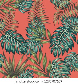 Multicolored exotic tropical leaves monstera seamless pattern trendy living coral background