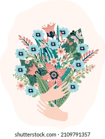 flores multicolores con las manos sobre un fondo beige