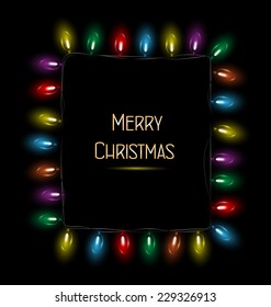 Multicolored glassy led Christmas lights garland like frame on black background