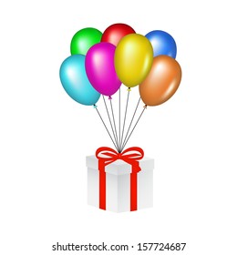 Multicolored glossy balloons lifting a gift box