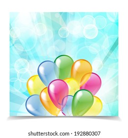 Multicolored glossy balloons on a blue bubbles background