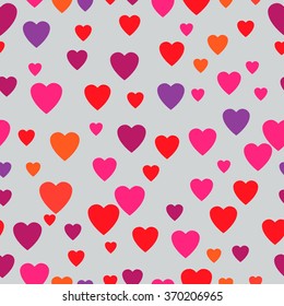 multicolored hearts. Seamless texture. gray background 