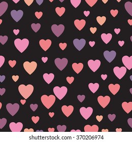 multicolored hearts. Seamless texture. red hearts on a black background 