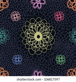 Multicolored lacy seamless pattern on dark background. Vector illustration