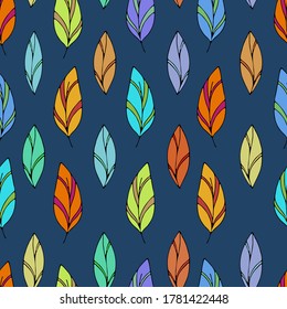 multicolored leaves in geometric order on a blue background in doodle style, vector seamless pattern