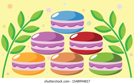 multi-colored macaroons with green leaves