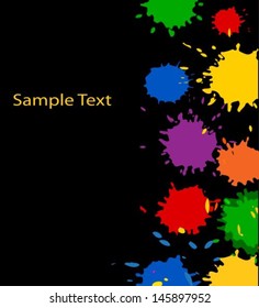 multicolored paint spots on a black background