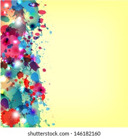 multicolored paint spots on a yellow background