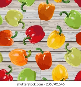 Multi-colored peppers on a wooden background.Seamless vector pattern with multicolored peppers on a wooden background.