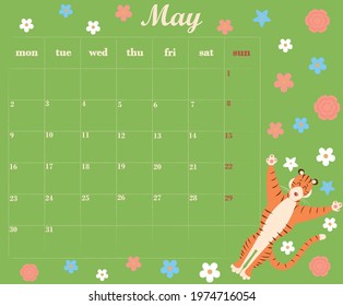 Multicolored planner for May 2022 depicting a cute tiger lying on a green spring meadow with wildflowers. Page with a calendar for May 2022 and a place to take notes. Vector illustration