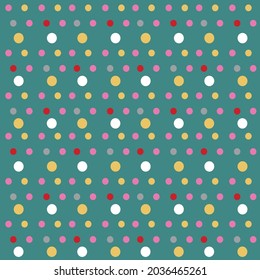 Pos de polka multicolores sobre un fondo verde