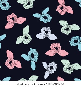 Multicolored random placed scrunchies seamless pattern with black background.