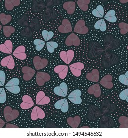 Multicolored seamless pattern with three-leaf clover. Repeat abstract botanical pattern. Vector illustration.