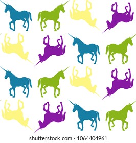 Multicolored seamless vector pattern of multi-colored unicorns, for printing on fabric, paper, packaging, etc.