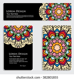 multicolored set of business card and header templates with hand drawn tribal ornament over black background, mandala, for greeting, invitation card, or cover. Vector illustration
