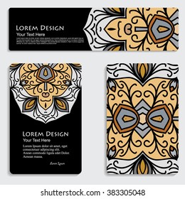 multicolored set of business card and header templates with hand drawn tribal ornament over black background, mandala, for greeting, invitation card, or cover. Vector illustration
