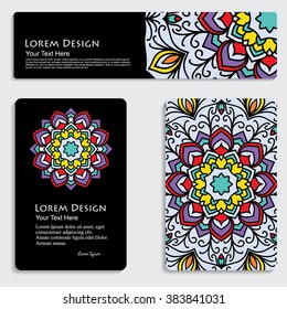 multicolored set of business card and header templates with hand drawn tribal ornament over black background, mandala, for greeting, invitation card, or cover. Vector illustration