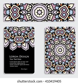 multicolored set of business card and header templates with hand drawn tribal ornament over black background, mandala, for greeting, invitation card, or cover. Vector illustration