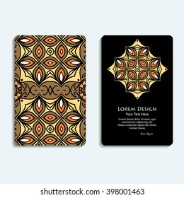 multicolored set of business card templates with hand drawn tribal ornament over black background, mandala, for greeting, invitation card, or cover. Vector illustration