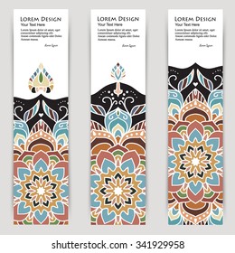 multicolored set of vertical banner templates with hand drawn tribal ornament over dark background, mandala. Vector illustration
