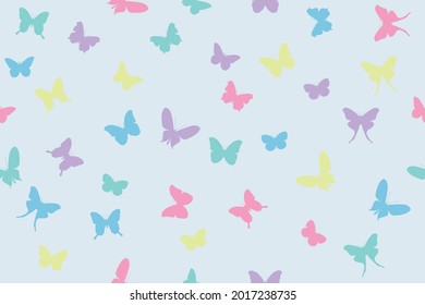 multicolored silhouettes of butterflies on a light background, seamless vector pattern