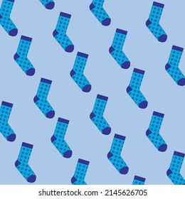 Multicolored socks on a blue background. Socks are scattered 