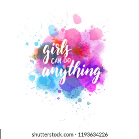 Multicolored splash watercolor blot with handwritten modern calligraphy text "Girls can do everything"