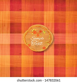 Multicolored square cloth texture background with paper floral label. Vector illustration