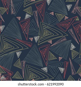 Multicolored triangles. Hand drawing. Seamless texture. Multicolored triangles on a dark background