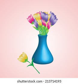 Multi-colored tulips in a beautiful vase.