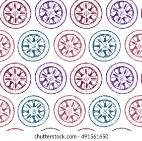 Multi-colored wheels. The wheels of the bicycle and motorcycle. Seamless texture.  Repeated pattern. It can be used as wallpaper, upholstery, wrapping, fabric or your design.