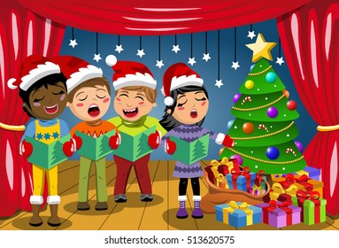 Multicultural Kids Wearing Xmas Hat And Singing Christmas Carol At Nativity Play On Stage