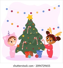 Multiethnic children decorate the Christmas tree