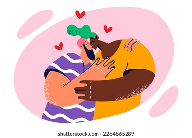 Multiethnic couple of man and woman make passionate kissing after long separation or break in relationship. Multiracial afro american girl and man kissing during walk or date together