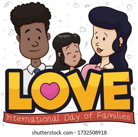 Multi-ethnic family, with dark skinned dad, brunette mom and daughter celebrating International Day of Families behind a golden sign showing Love during this date.