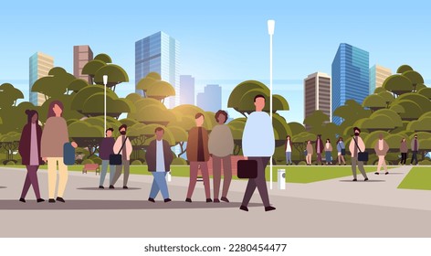 multiethnic people group walking outdoor mix race men women crowd spending time in urban park
