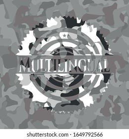 Multilingual on grey camo texture