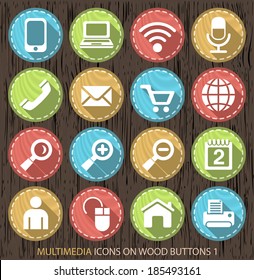 Multimedia Contemporary Icons on Wood Vintage Circular Buttons on Black Background 1.