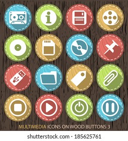 Multimedia Contemporary Icons on Wood Vintage Circular Buttons on Black Background 3.