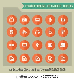 Multimedia devices icons on bright orange flat circles