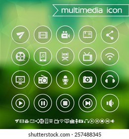 Multimedia icons on blurred background