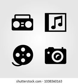 Multimedia icons set. Vector illustration compact disk, boombox, photo camera and film roll