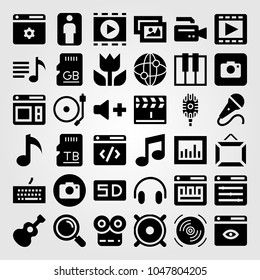 Multimedia icons set. Vector illustration clapperboard, mic, browser and man