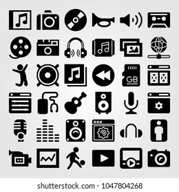Multimedia icons set. Vector illustration jumping man, video camera, photo camera and speaker