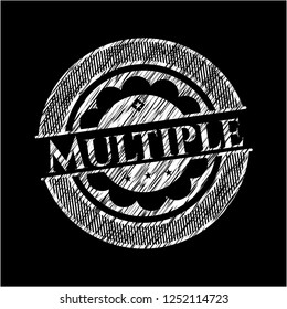 Multiple chalkboard emblem on black board