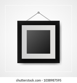 Multiple many small picture and photo frames on white wall