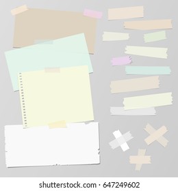 Multiple pieces of sticky tape and different notepaper on grey background 