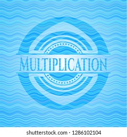 Multiplication water badge.