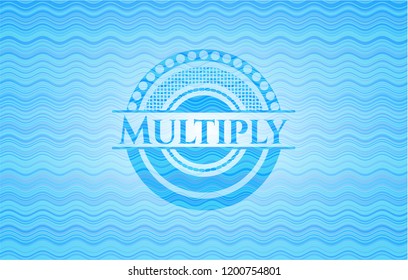 Multiply water wave badge.
